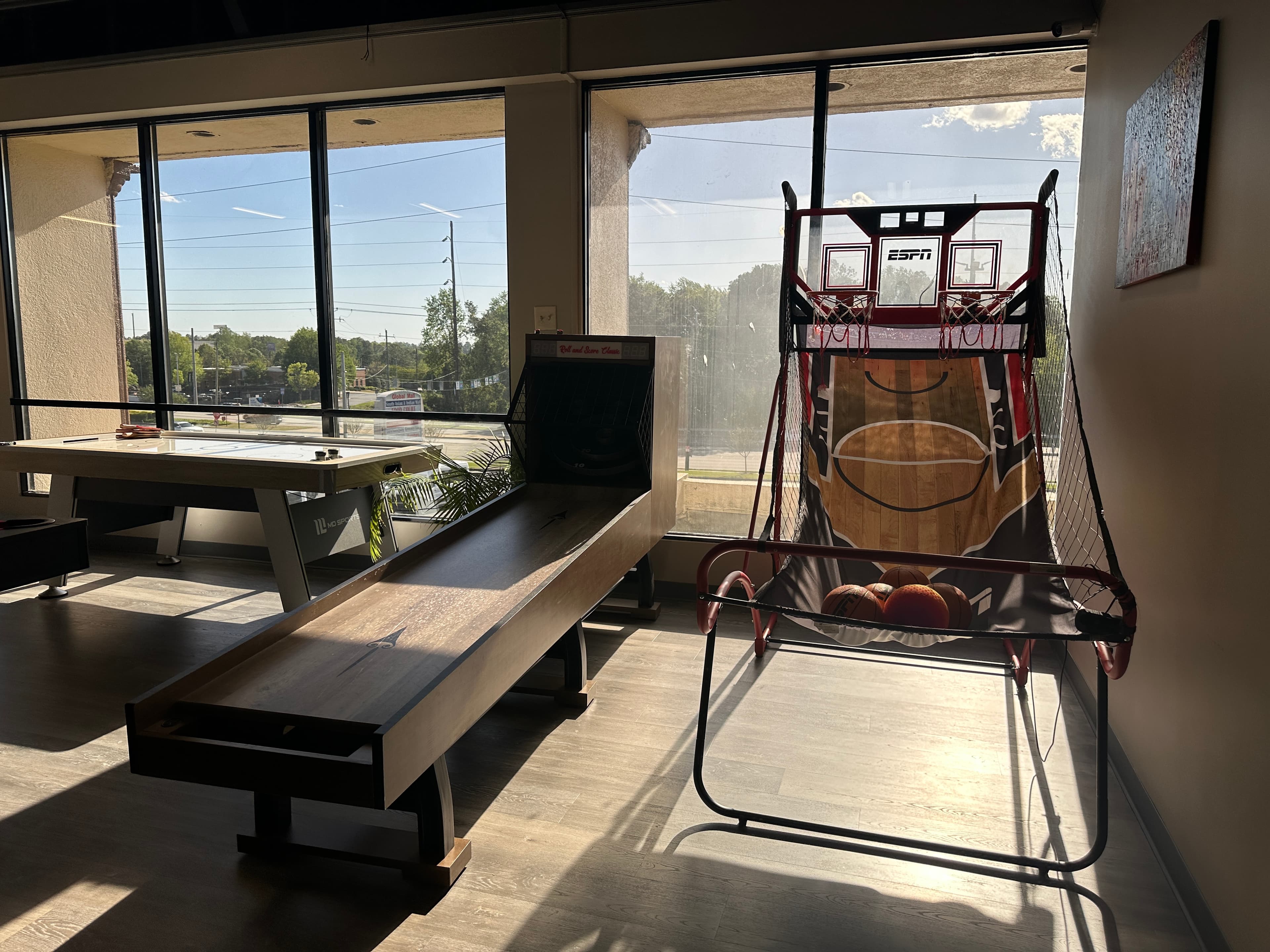 A basketball arcade machine in the games room